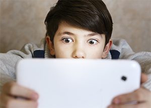 teen addicted to screen time